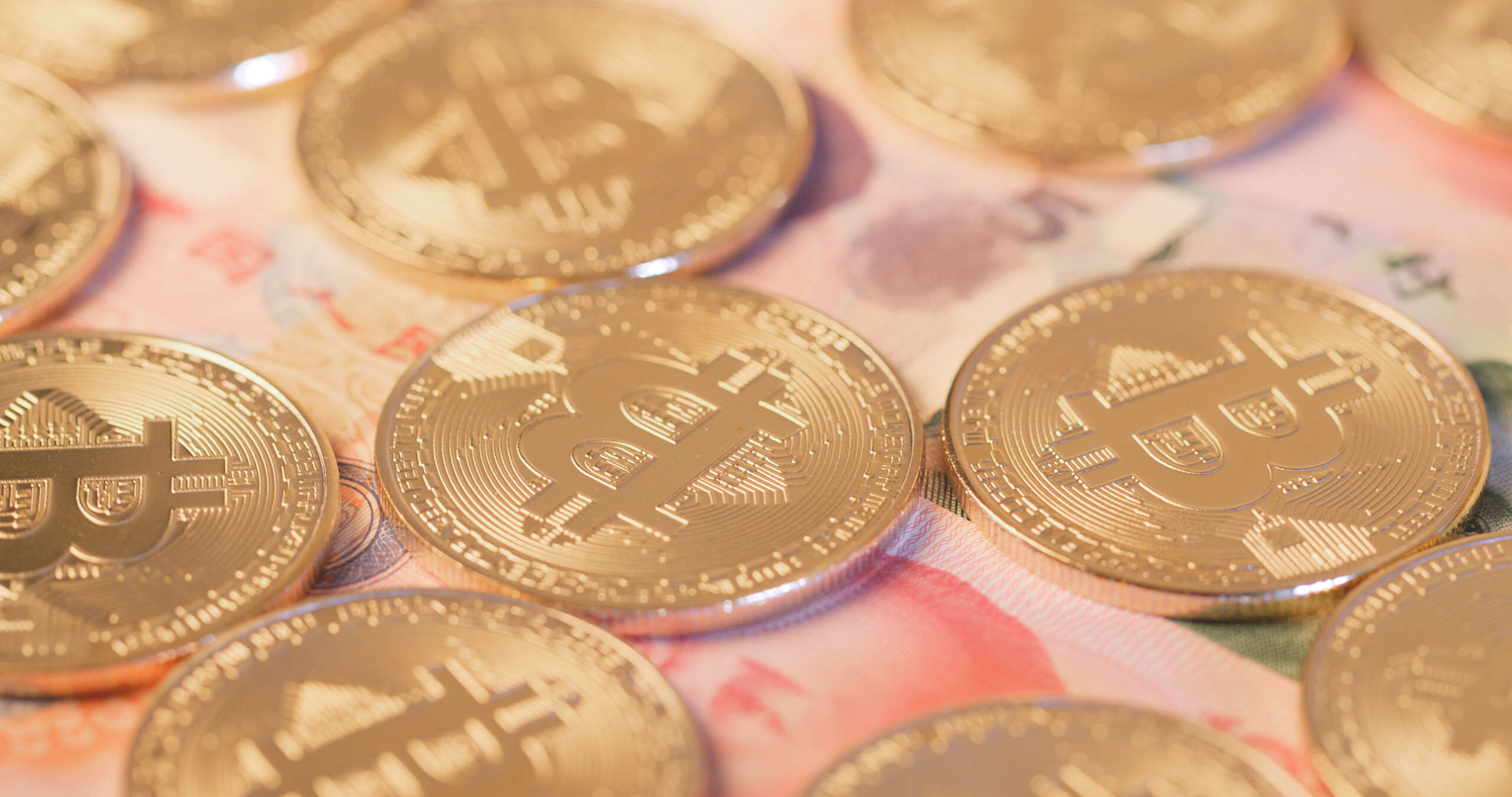 bitcoin-over-chinese-banknote-renminbi-2021-08-29-07-40-06-utc-scaled (1).jpg